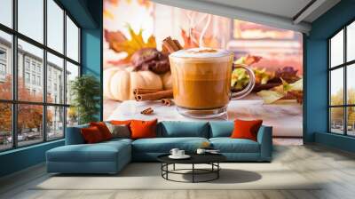 Pumpkin spice coffee on a marble board, hot seasonal drink for fall Wall mural