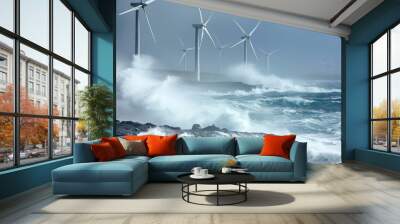 A row of wind turbines stand tall against a backdrop of crashing waves and a stormy sky. The wind is whipping up the water, creating a dramatic scene of power and energy. Wall mural