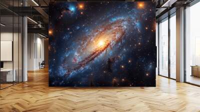 A vibrant spiral galaxy illuminated by thousands of stars in the depths of space at night Wall mural