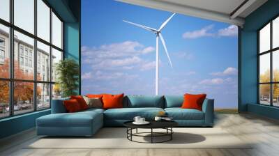 Wind turbine under blue sky Wall mural