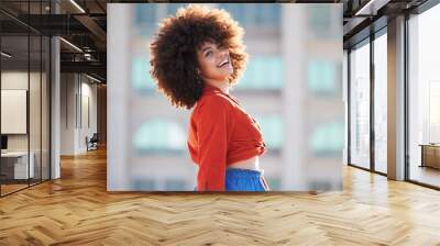 Fashion, happy and smile with black woman in city for freedom, youth and urban lifestyle. Relax, motivation and happiness with face of girl laughing in outdoor for peace, summer and wellness Wall mural