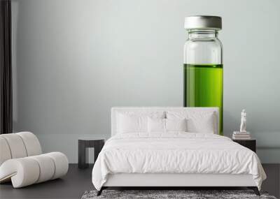 Green liquid in clear vial on white background with space for text Natural light Wall mural