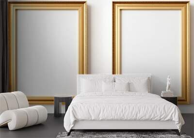 Two vertical gold frames are mounted on a white wall, creating a simple and elegant display. The frames are empty, ready to showcase artwork, photos, or posters. Wall mural