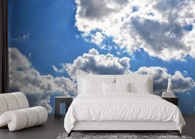 White clouds in blue sky at sunny day Wall mural