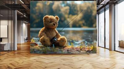 brown teddy bear sits by the lake with a fishing rod and catches fish Wall mural