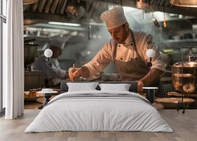 Chef preparing food in a restaurant kitchen Wall mural