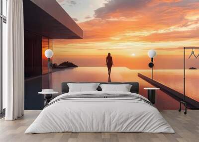 Woman walking on tranquil sunset Wall mural