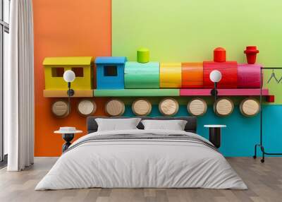 wooden multicoloured toy train isolated on colorful background Wall mural