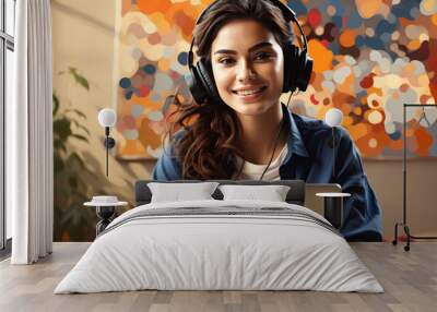 woman wearing headphones use the laptop Wall mural