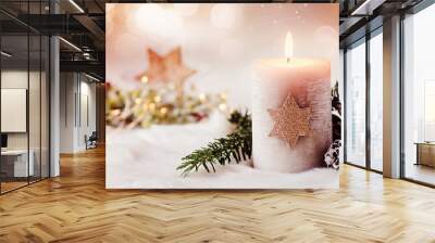 Romantic winter and christmas greeting card with text - Burning candle with natural fir and pine cone decoration on a bright background and copy space Wall mural