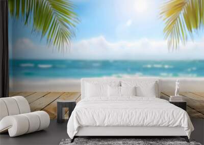 Empty wooden table top with a blurred beach and palm leaves background for product display montage, depicting a summer vacation concept. Wall mural