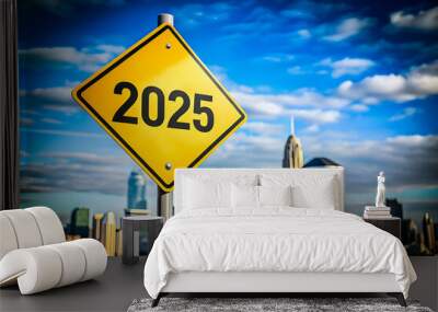 Photo Text 2025 on yellow sign against blue sky. New Year resolution and goal to change and progress, business success and growth strategy, future challenge vision, start or beginning, startup, calend Wall mural