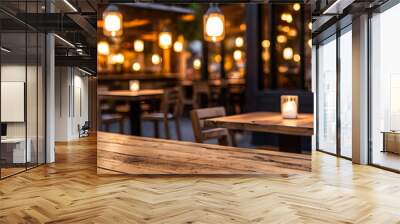 photo wooden table and blurred background of outdoor restaurant with bokeh light. High quality photo  Wall mural