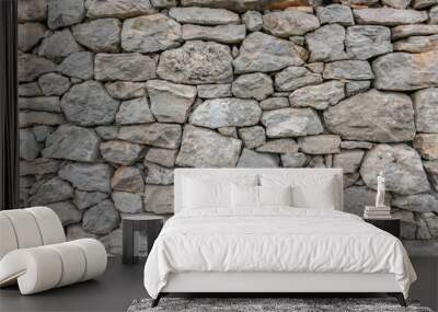 Stone wall texture background - grey stone siding with different sized stones  Wall mural