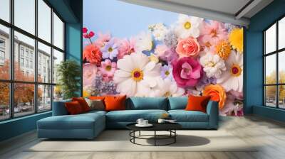 Vibrant assortment of blossoms and aromatic herbs elegantly arranged in a vase atop a table Wall mural