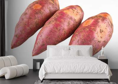 Close-up of three fresh, raw sweet potatoes isolated on white background. Perfect for healthy eating and organic food concepts. Wall mural