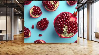 Glossy pomegranate seeds, deep red, 3D render on a light blue background Wall mural