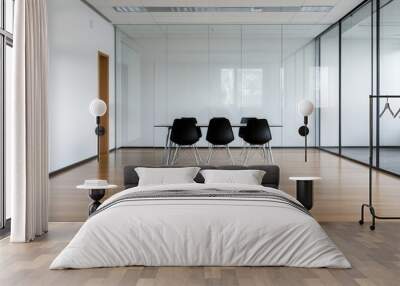 A modern glass meeting room with white walls and black chairs, wooden floor Wall mural