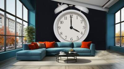 Old-style alarm clock, black and white, it's four o'clock. Wall mural