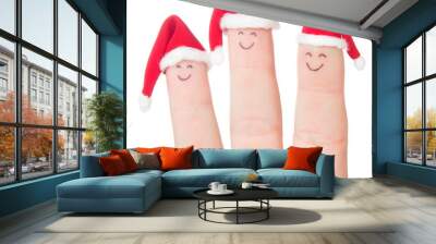 fingers faces in santa hats. happy family celebrating concept fo Wall mural