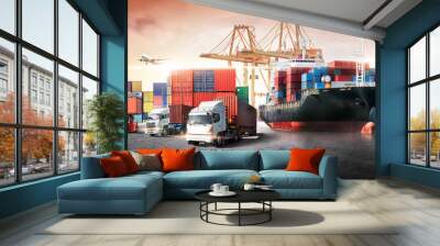 Business logistics and transportation concept of container cargo ship and cargo plane with working crane bridge in shipyard at sunset sky, logistic import export and transport industry background Wall mural