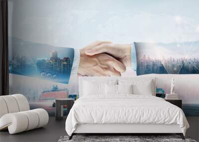 International business logistics transportation teamwork concept, double exposure of handshake partnership import export delivery background and modern futuristic of container cargo freight ship truck Wall mural