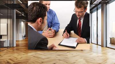 Three business men handling negotiations. Wall mural