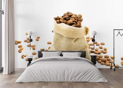 Coffee beans isolated on a white background. Full of coffee beans in a sack. Close-up. Wall mural