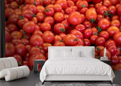 fresh cherry tomatoes in the market. cherry tomatoes in bulk. ripe cherry tomatoes in a street market Wall mural