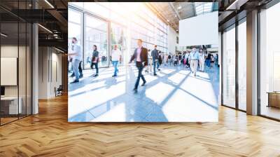 blurred people walking in a modern hall Wall mural