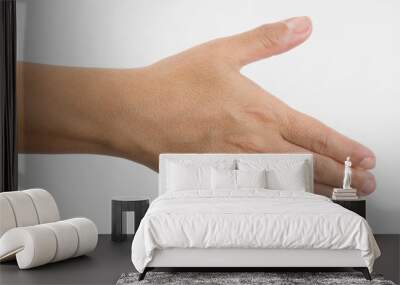 Close-up of a woman's hand and finger on white background Wall mural