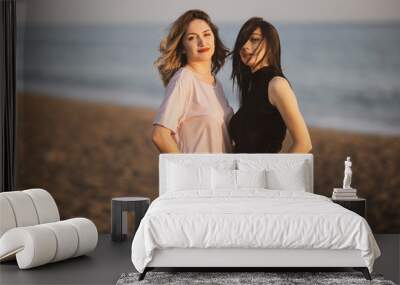 two beautiful young girls on the beach Wall mural