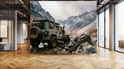 Create a picturesque image of an off-road vehicle climbing a rocky trail in the wilderness. The vehicle should be rugged and capable, with dirt and mud splattered on its body.  Wall mural