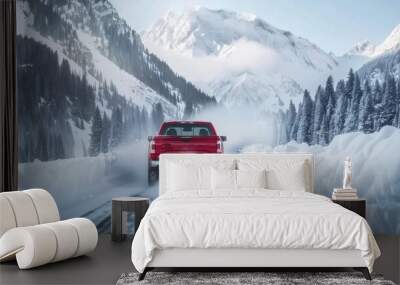 Envision a pickup truck driving through a snowy mountain pass, carrying skiers and snowboarders to a remote slope.  Wall mural