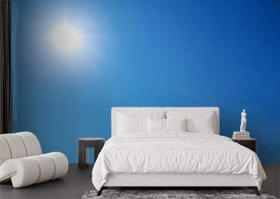 bright sun shines on clear blue sky Wall mural