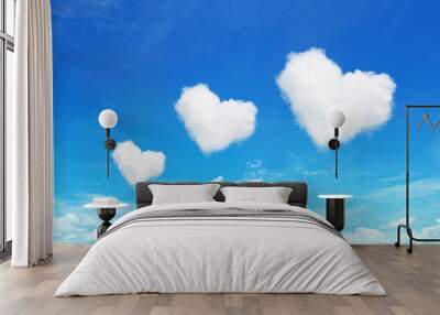 three heart shaped clouds on blue sky Wall mural