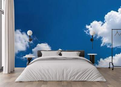 Clear blue sky with white clouds Wall mural