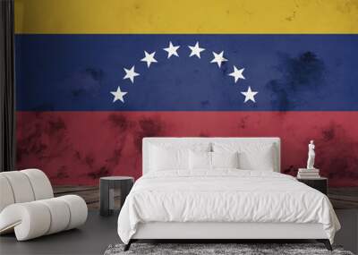 The floor of planks and plastered wall with a painted Venezuela flag.  Wall mural