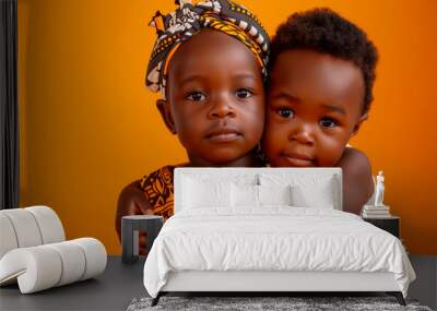 couple of happy african children on orange background Wall mural