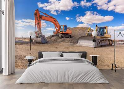 Group of excavator working on a construction site Wall mural