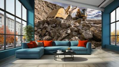 Large excavator moving stone in an open-air mine in Spain Wall mural