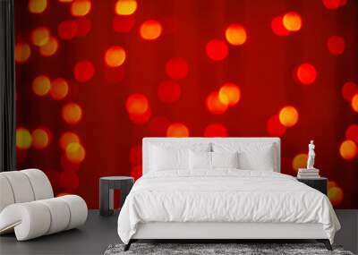 Red-orange trendy festive background of blurry Christmas lights Wall mural