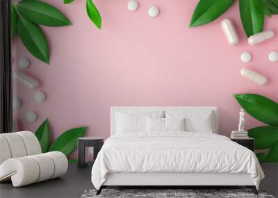 Minimalist composition with green leaves and white pills on a pink background, promoting natural health and wellness. Wall mural