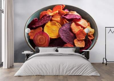 a bowl of colorful vegetable chips including beet carrot and sweet potato chips Wall mural