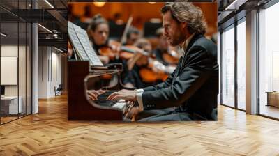 Close-up of a pianist playing the piano along with the orchestra at a classical concert Wall mural