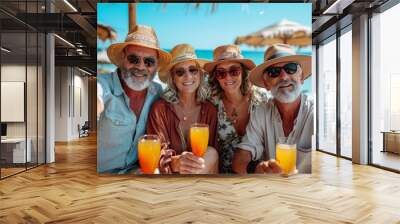 Group of mature friends with hats and sunglasses taking a selfie while having fun in a paradise. Wall mural