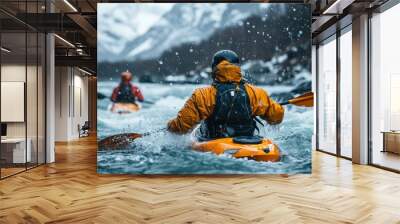 Two companions descending a whitewater river by kayak, surrounded by snow-capped mountains. Concept adventure, sport Wall mural