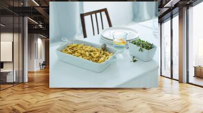 pasta with pesto on the table Wall mural