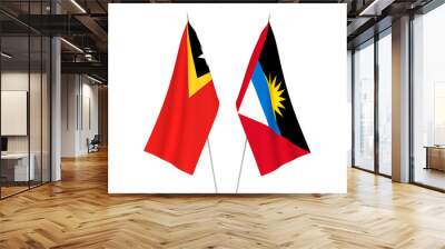 National fabric flags of Antigua and Barbuda and East Timor isolated on white background. 3d rendering illustration. Wall mural