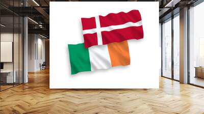 National vector fabric wave flags of Ireland and Denmark isolated on white background. 1 to 2 proportion. Wall mural